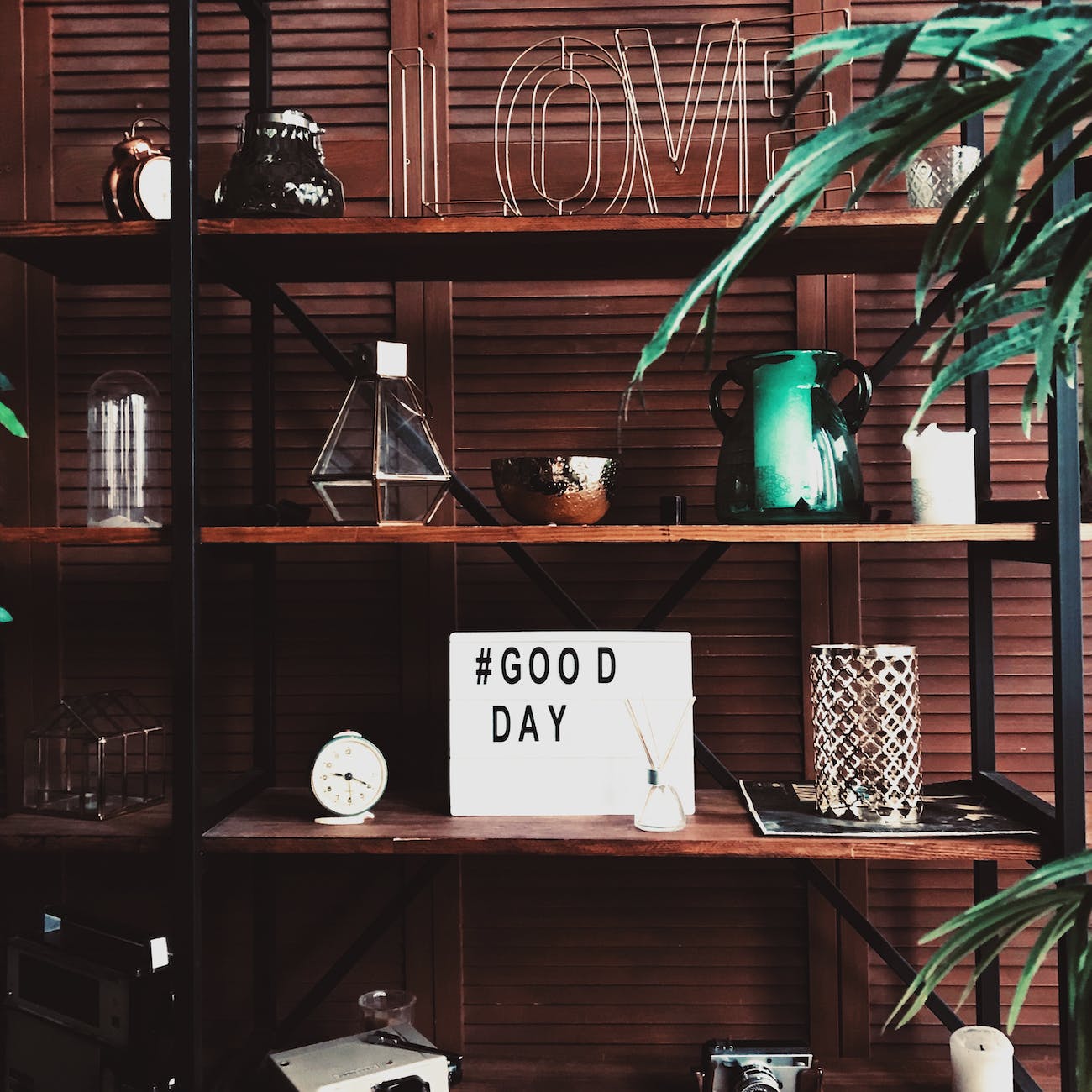shelves with decor and good day wish board